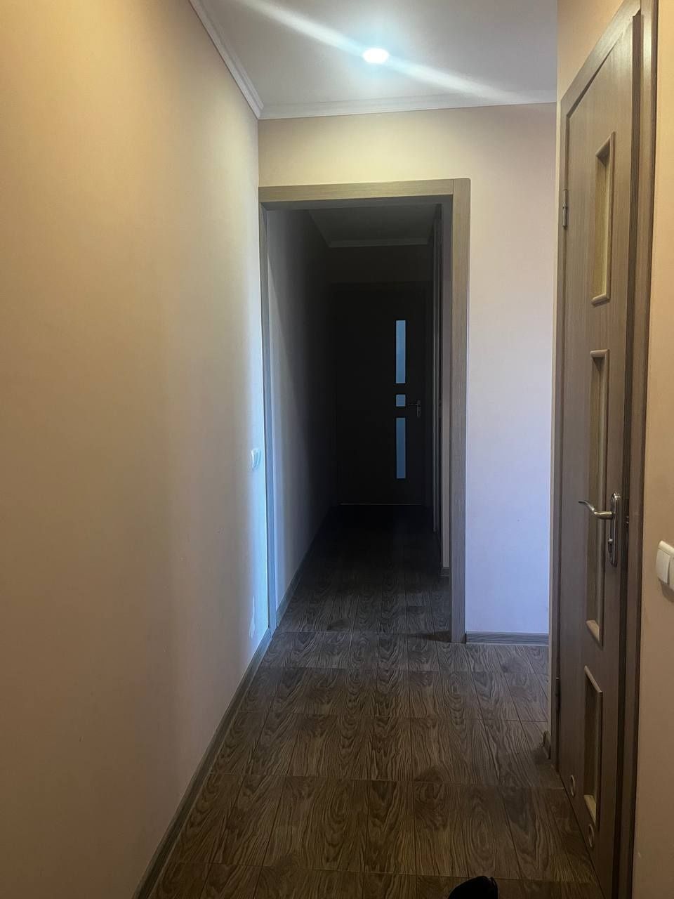886940312